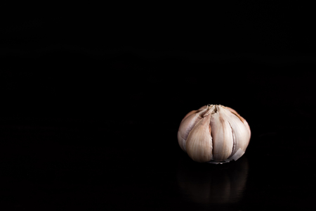 Close up Garlic on dark backgroundの写真素材