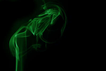 Green smoke on black backgroundの写真素材