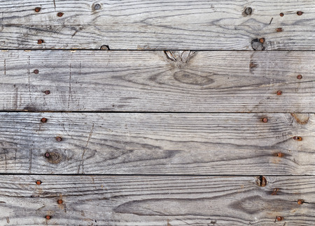 background wooden boards aged in horizontal positionの写真素材