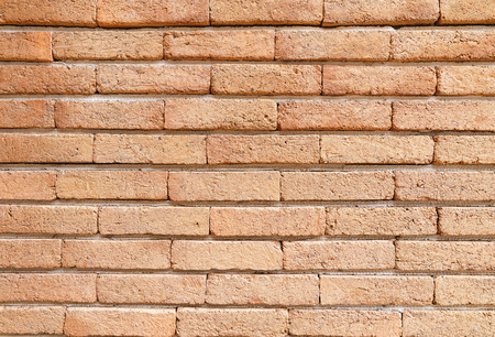 closeup of red brick wall background textureの写真素材