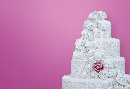 Wedding cake with luxury decorated on pink backgroundの写真素材