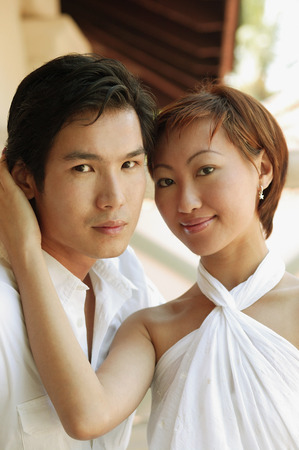 Couple looking at camera,portraitの写真素材