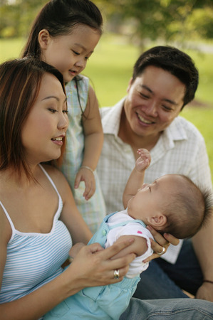 Family sitting together, portraitの写真素材