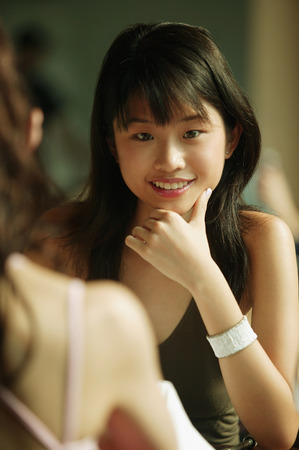 Young woman smiling, portraitの写真素材