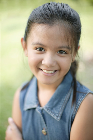 Young girl smiling, portraitの写真素材