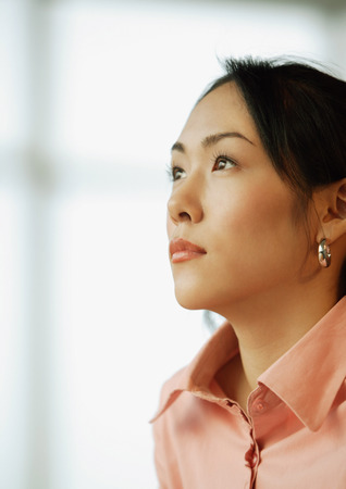 Young woman, looking awayの写真素材