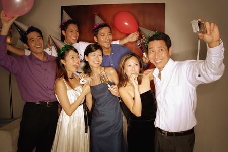 Group of friends posing for a pictureの写真素材