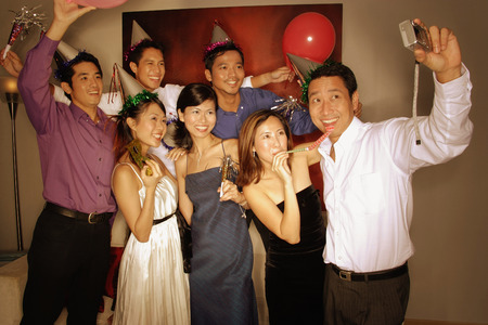 Group of friends posing for a pictureの写真素材