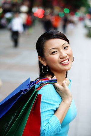 Young woman, looking at camera, smilingの写真素材