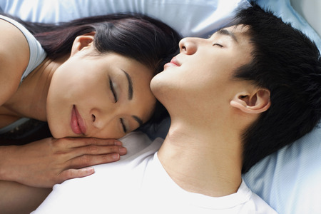 Couple sleeping, head shotの写真素材