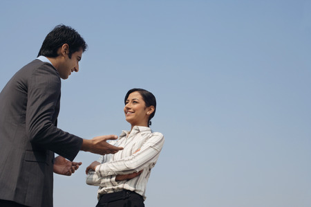 woman and man discussing business (horizontal)の写真素材