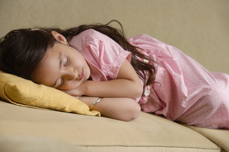 girl sleeping on couch