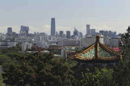 City scape of Beijing with Jingshan Pagoda in foreground, Chinaの写真素材
