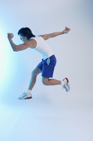Man running and jumpingの写真素材