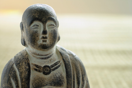 Still life of small Buddha sculptureの写真素材