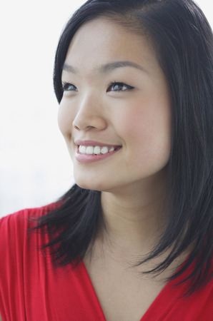 Woman smiling, head shotの写真素材