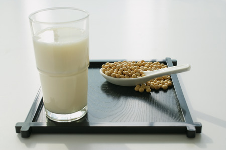 Still life of soya bean drink and soya beansの写真素材