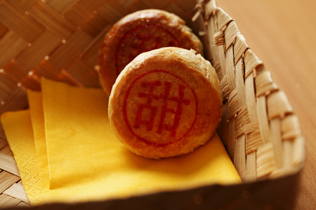 Chinese bean paste pastry with Chinese word for 'sweet'の写真素材