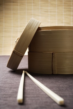 bamboo steamer and chopsticksの写真素材