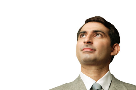 Businessman, looking up, head shotの写真素材