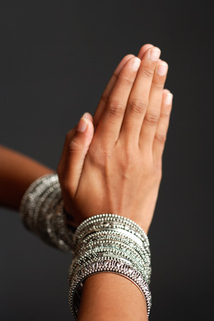 Close-up of woman's hands together in prayer position
