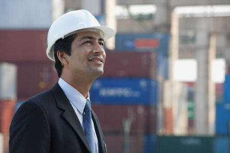 Man with helmet looking up