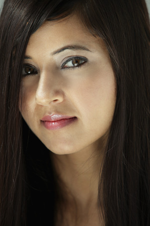 head shot of woman with long hairの写真素材