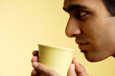Man holding mug , profileの写真素材