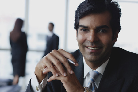 Businessman smiling at cameraの写真素材