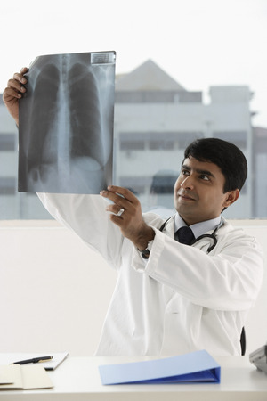 doctor viewing x-rayの写真素材