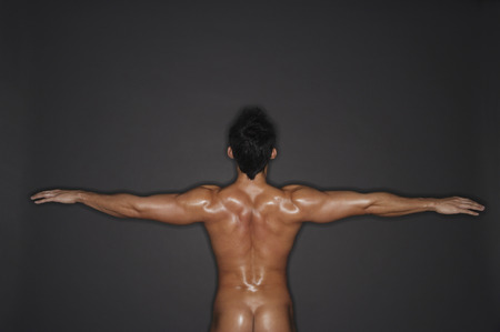 backside of muscular manの写真素材