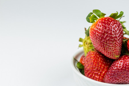 Half of strawberry isolated on white backgroundの写真素材