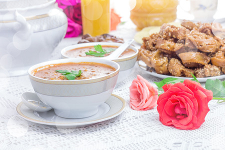 Bowl of Moroccan harira soup,chebakia, dates for iftarの写真素材
