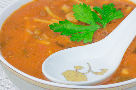 Bowl of Moroccan harira soup,chebakia, dates for iftarの写真素材