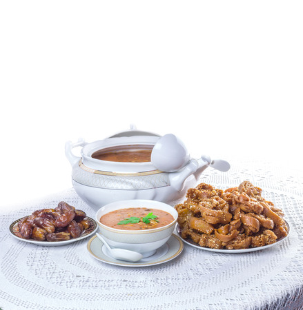 Bowl of Moroccan harira soup,chebakia, dates for iftarの写真素材