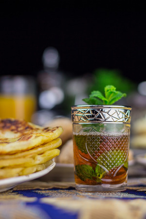 Moroccan tea glasses and biscuitの写真素材