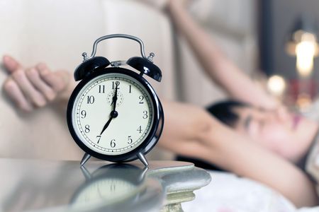 Waked Up by the Noise of Alarm clockの写真素材