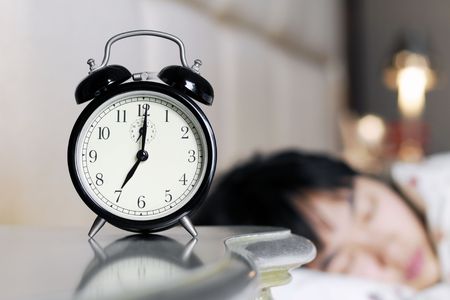 Waked Up by the Noise of Alarm clockの写真素材