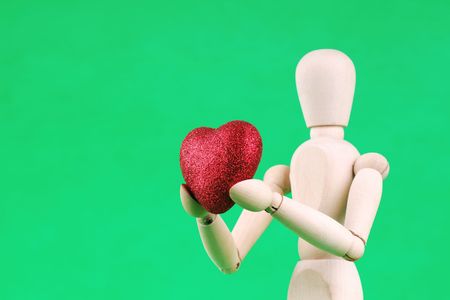 Wooden Person Give You His Heartの写真素材