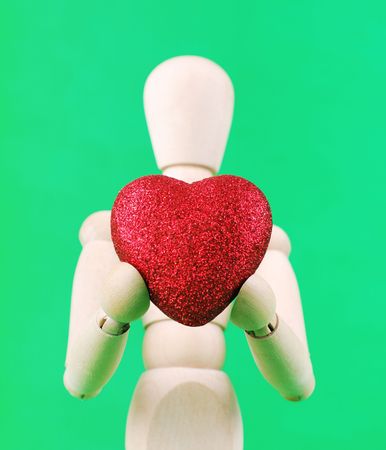 Wooden Person Give You His Heartの写真素材