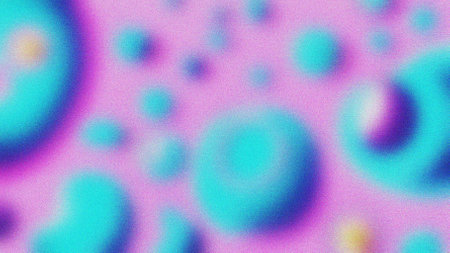 abstract background: multi-colored spots of light on a pink background
