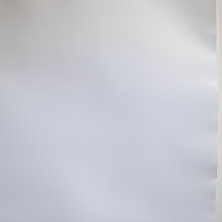 Blurred abstract background of white wall with copy space for text.の素材
