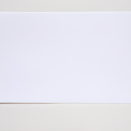 Blank white paper sheet on white background with copy space for textの素材