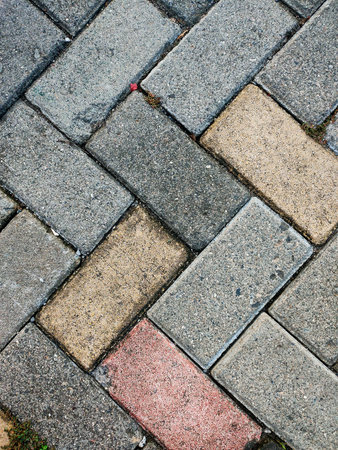 Cobblestone walkway in the city. Abstract background and texture for design.の写真素材