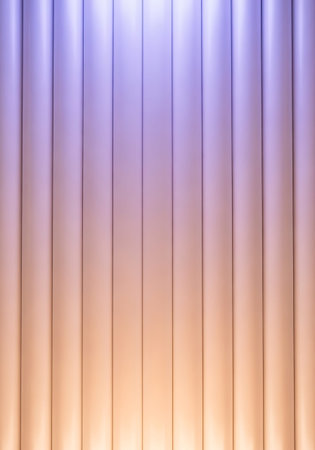 Symmetrical White Cylindrical Tubes Background Subtly Illuminated by Soft Gradient Light.