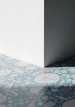 Detailed Worm's-Eye View: Blue Terrazzo Floor and Clean White Wall.