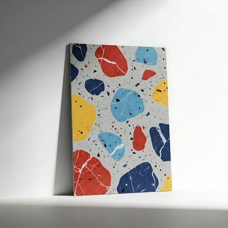 Abstract Composition: Oversized Primary-Colored Terrazzo Tile Sample Against White Wall.
