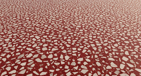 Rustic Deep Red Terrazzo Floor Texture Worn by Warm Golden Hour Light.