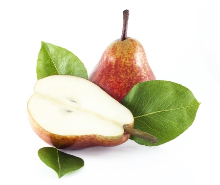 Half of pear  with leafs and another pear on a white backgroundの写真素材