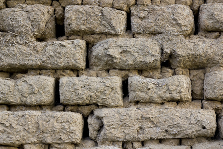 Old wall from clay bricksの写真素材